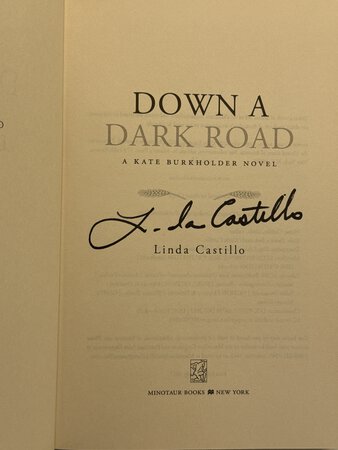 DOWN A DARK ROAD: A Kate Burkholder Novel. by Castillo, Linda.