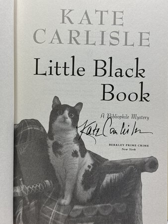 LITTLE BLACK BOOK: A Bibliophile Mystery. by Carlisle, Kate.