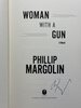 Another image of WOMAN WITH A GUN. by Margolin, Phillip.
