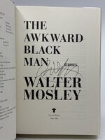 THE AWKWARD BLACK MAN: Stories by Mosley, Walter.