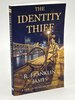Another image of THE IDENTITY THIEF: A Hollis Morgan Mystery. by James, R. Franklin.